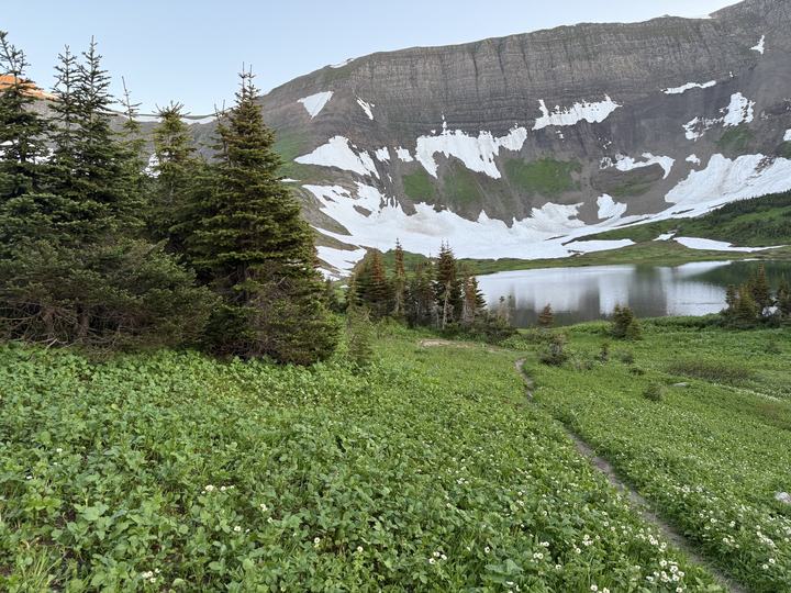 Late-season snowfields on the cliffs above Windfall Lake