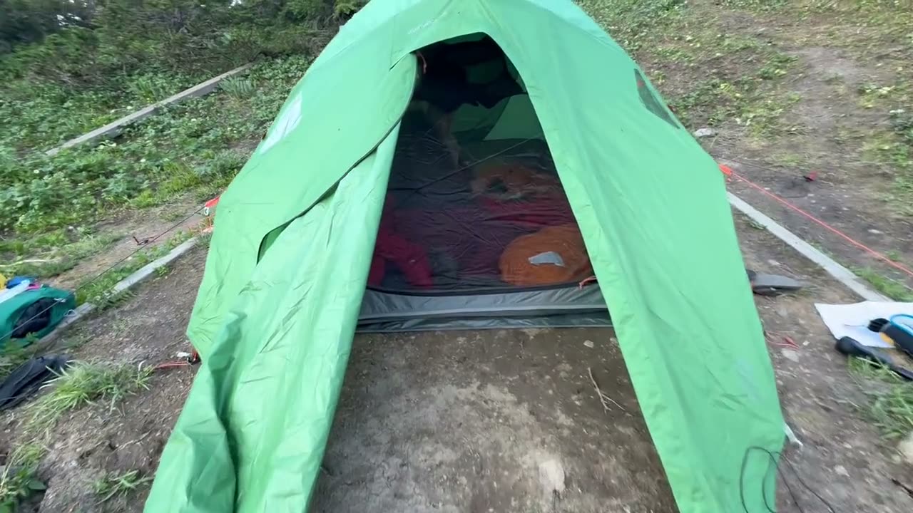 Inside the backpacking tent at Windfall Lake with sleeping bags laid out