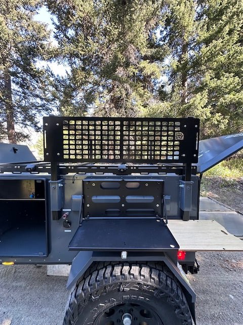 The drop-down kitchen counter and MOLLE panel on the rear of a Rove Recon